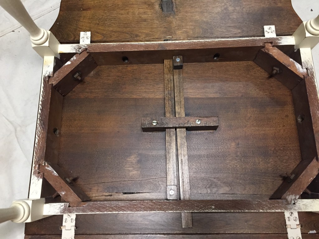 Reassembling drop leaf table after staining top